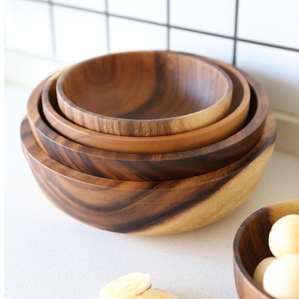Natural wooden salad bowl by LuxeGlow Essentials, perfect for fruit, salads, and kitchen food containers in home or restaurant settings.