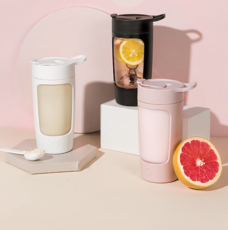 PureGlow portable juice blender with a compact design and clear blending jar, perfect for healthy smoothies on the go.