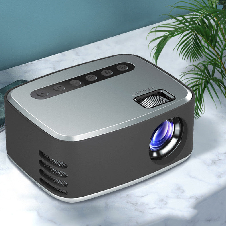 Mini Portable 1080P HD projector by PureGlow displaying a clear image on a wall in a home setting.