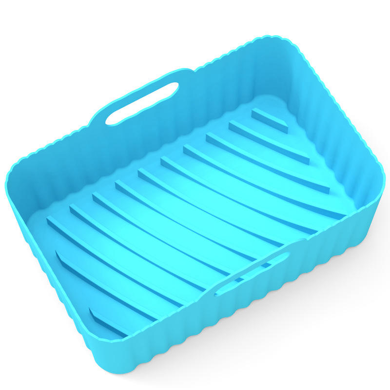 PureGlow reusable air fryer silicone liner lying inside a kitchen air fryer, showcasing non-stick, reusable kitchen accessory.