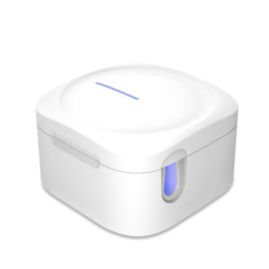 PureGlow UV toothbrush sterilizer box for oral care, showing the compact sterilizer with toothbrush inside in a clean setting.