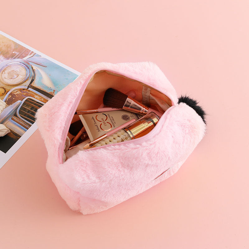 PureGlow travel makeup bag with multiple compartments, compact design, ideal for organizing cosmetics on the go.