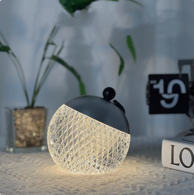 LuxeGlow Essentials portable small night lamp with modern minimalist design, dimmable for creating a relaxing atmosphere.