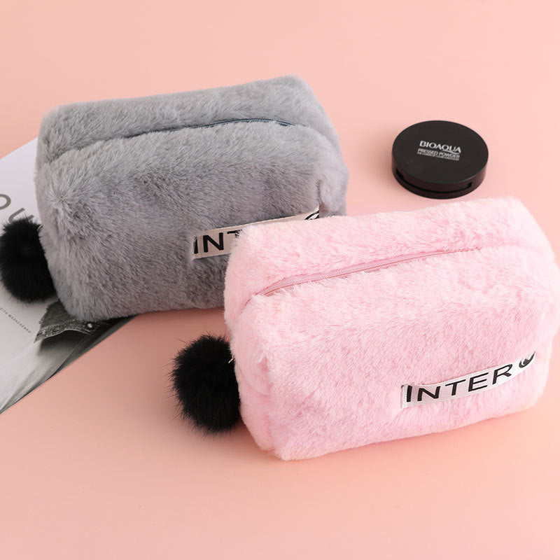 PureGlow travel makeup bag with multiple compartments, designed for organizing cosmetics and toiletries on the go.