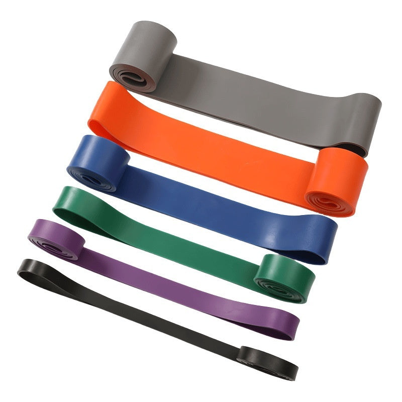 PureGlow fitness resistance bands set with multiple colorful elastic bands for strength training and workouts.