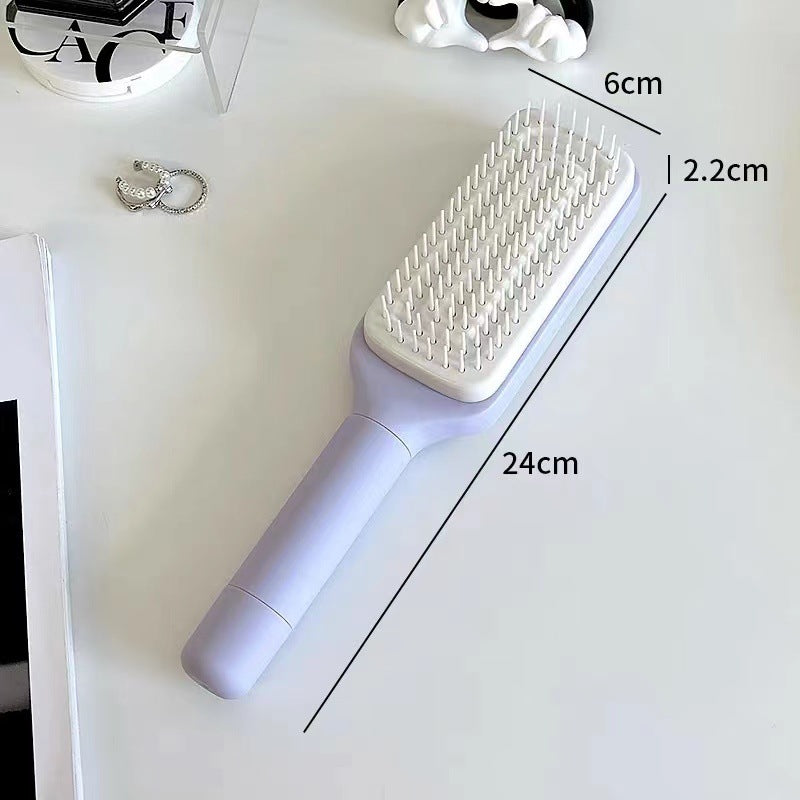 PureGlow self-cleaning 4-in-1 hair brush with ergonomic handle and multiple brush heads for versatile hair styling and detangling.