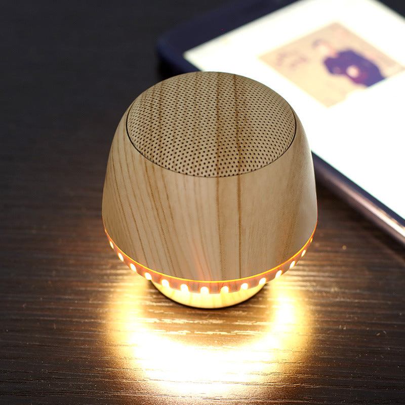 LuxeGlow Essentials portable mushroom-shaped TWS audio pair with LED night light and compact charging case.