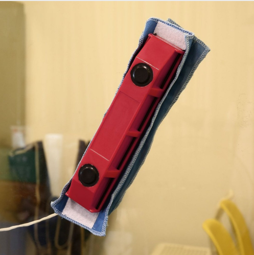 PureGlow double-sided magnetic window cleaner for easy, streak-free cleaning of both sides of glass windows.