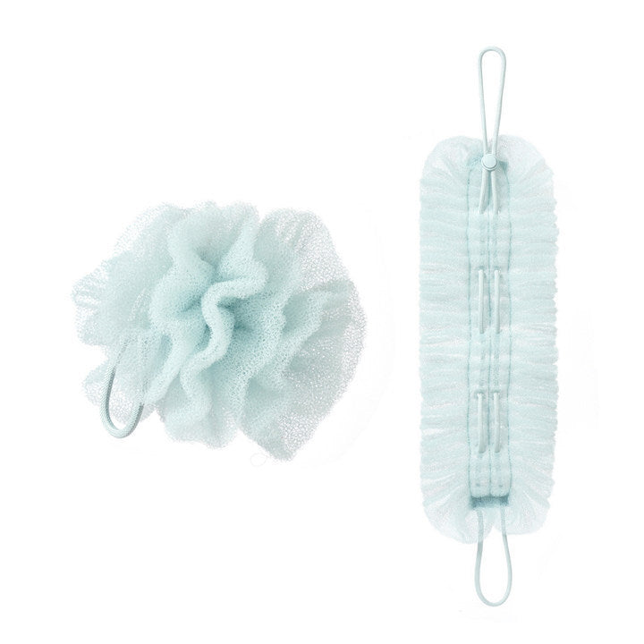 PureGlow stretchable loofah bath towel in use, showing its soft, flexible texture and size as a bath accessory.