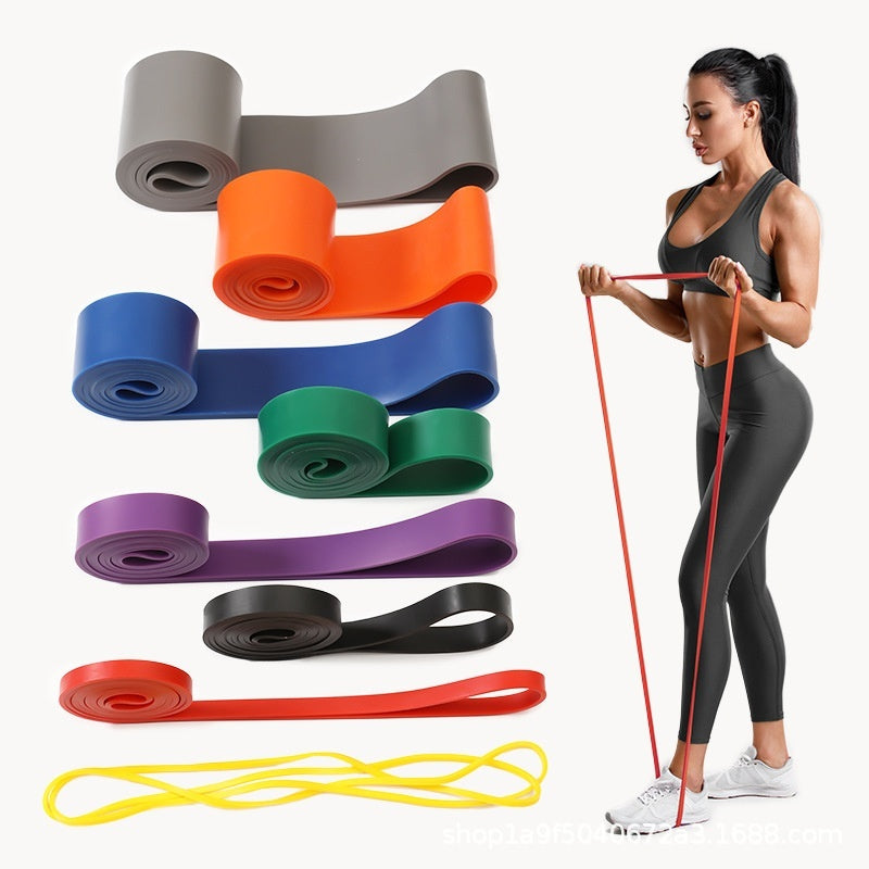 PureGlow fitness resistance bands set with colorful elastic bands for strength training and workout exercises.