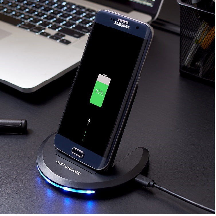 PureGlow wireless charging stand for baby care, featuring a sleek design with a charging pad and adjustable support for easy device charging