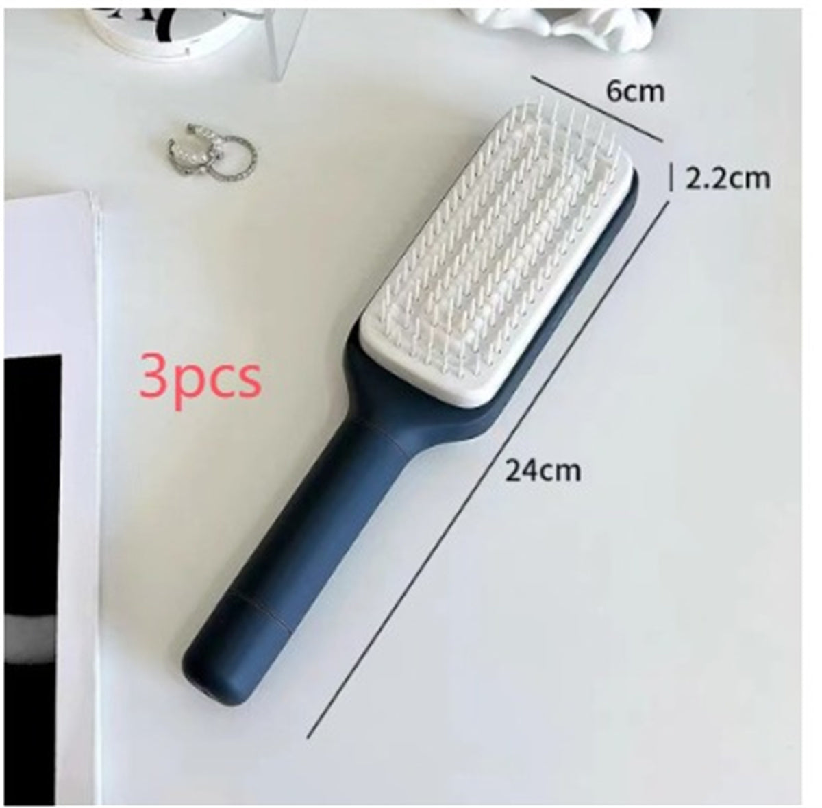 PureGlow self-cleaning 4-in-1 hair brush with ergonomic handle and versatile design, ideal for detangling and styling hair.
