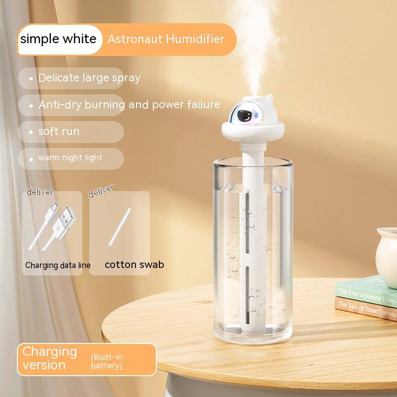 PureGlow astronaut-shaped portable mini humidifier on a bedside table, showing its compact design and mist output.