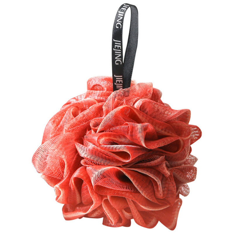 PureGlow soft bubble bath loofah ball for gentle exfoliation and luxurious bathing experience, shown in the image.