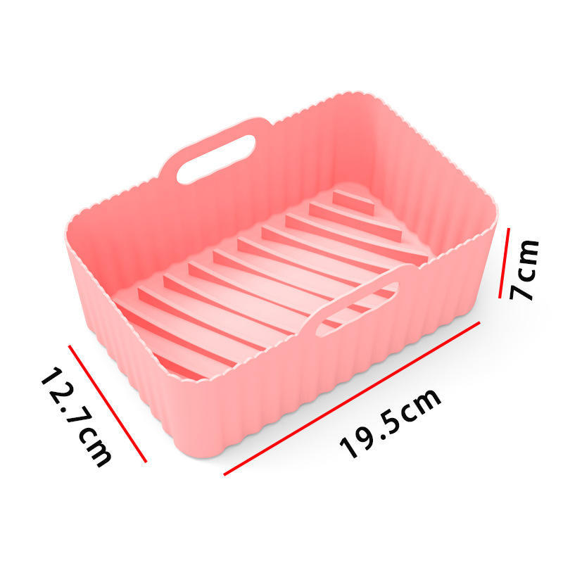 PureGlow reusable air fryer silicone liner resting inside a kitchen air fryer, designed for easy cleaning and heat resistance.