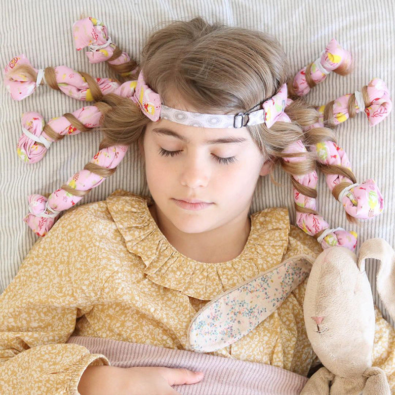 PureGlow heatless curling rod ribbon headband for hair accessories, shown in a close-up of the stylish, stretchy hairband.