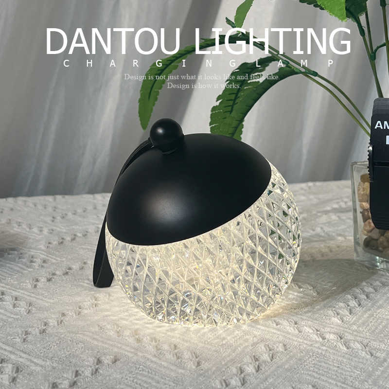 LuxeGlow Essentials portable small night lamp with modern minimalist design, dimmable for cozy atmosphere in health and wellness settings.