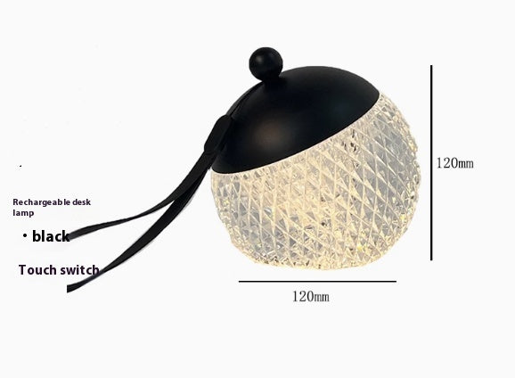 LuxeGlow Essentials portable small night lamp with modern minimalist design, dimmable for creating a relaxing atmosphere.